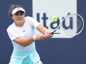 Bianca Andreescu hits a backhand against Ashleigh Barty in the women's singles final in the Miami Open at Hard Rock Stadium in Miami, April 3, 2021.