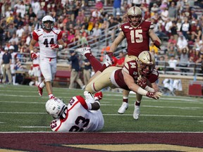 Former Boston College tight end Jake Burt (84) dives into the end zone for a touchdown. The Hamilton Tiger-Cats opened the 2021 CFL draft on Teusday by taking the 6-foot-4, 245-pounder who was on to the New England Patriots’ practice roster in 2020.