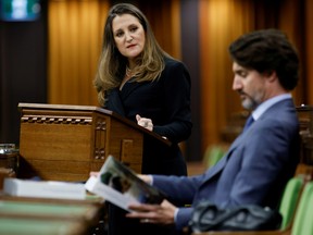 Canada's Finance Minister Chrystia Freeland looks at Prime Minister Justin Trudeau as she delivers the budget in the House of Commons on Parliament Hill in Ottawa, Ontario, Canada, April 19, 2021.