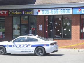 A gunman on foot is accused of shooting up a restaurant in Mississauga, killing one man and wounding several members of his family.