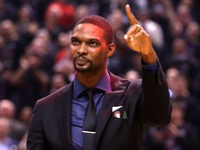 Former Toronto Raptors Chris Bosh is recognized on court during Game 1 of the 2019 NBA Finals between the Toronto Raptors and the Golden State Warriors at Scotiabank Arena on May 30, 2019 in Toronto.