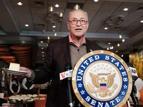 U.S. Senate Majority Leader Chuck Schumer (D-NY) attends a ribbon cutting and the official re-opening of Junior’s restaurant in Times Square which had been closed during the pandemic, on Thursday, May 6, 2021 in New York City.
