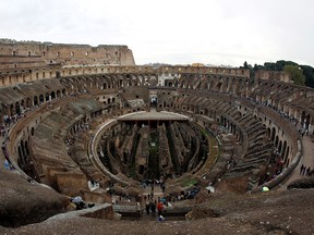 People visit Rome's ancient Colosseum, Oct. 14, 2010.