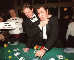 Shayne Corson and Darcy Tucker goof around during a charity casino in support of Covenant House in 2005. The two have a tight bond, with Tucker marrying Corson’s sister Shannon. The Tuckers and Corsons live five doors down from one another, and Corson’s mom lives with Tucker and his clan. FRED THORNHILL/SUN FILES