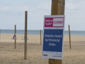 Beach volleyball courts are off limits at Woodbine Beach in Toronto due to the provincial stay-at-home order on Sunday, April 25, 2021.