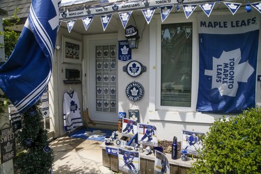 Sara Adamson, who owns a home on Merton St., displays her digs decorated to support the Toronto Maple Leafs in their upcoming playoff series on Wednesday, May 19, 2021.