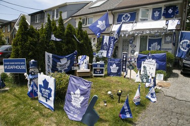 Sara Adamson, who owns a home on Merton St., displays her digs decorated to support the Toronto Maple Leafs in their upcoming playoff series on Wednesday, May 19, 2021.