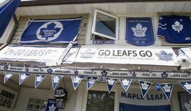 Sara Adamson, owner of her home on Merton St. displays her home decorated to support the Toronto Maple Leafs in their upcoming playoff series on Wednesday May 19, 2021. Veronica Henri/Toronto Sun/Postmedia Network