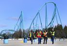 Health-care workers get ready to take patients at a drive-thru COVID-19 mass vaccination site at Canada's Wonderland during the COVID-19 pandemic on March 29, 2021.  