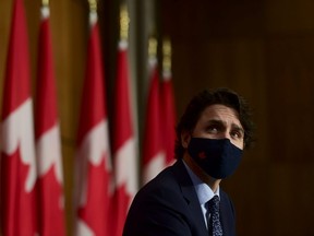 Prime Minister Justin Trudeau looks on during a press conference to update Canadians on the COVID-19 pandemic, in Ottawa on Friday, May 7, 2021.