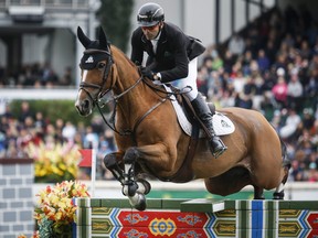 Canada's Eric Lamaze riding Fine Lady 5 during the CP International competition at the Spruce Meadows Masters in Calgary, Alta., Sept. 8, 2019.