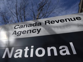 The Canada Revenue Agency sign outside the National Headquarters at the Connaught Building in Ottawa is seen on March 1, 2021.