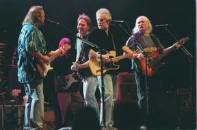 Stephen Stills, Neil Young, Graham Nash and David Crosby jam before a packed house at Toronto’s Air Canada Centre in 1999.