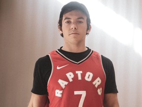 Actor and hip-hop artist Connor Price sports a Raptors jersey.