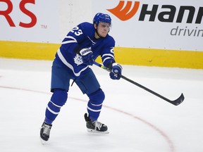 Maple Leafs defenceman Travis Dermott makes an  outlet pass against the Montreal Canadiens earlier this season.