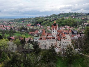 Bran Castle towers above Bran commune, in Brasov county, Romania, May 8, 2021.