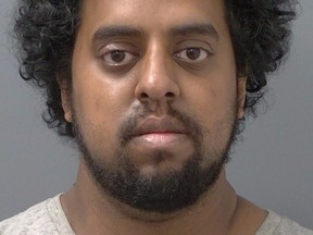 Adam Khan, who was charged May 26, 2021 with possession of child pornography.