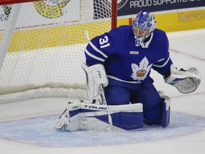 Goalie Frederik Andersen makes a toe save during his conditioning stint with the AHL's Marlies in Toronto on Thursday, May 6, 2021.