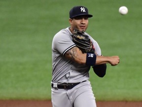 Gleyber Torres of the New York Yankees fields a ball during the first inning against the Tampa Bay Rays at Tropicana Field on May 11, 2021 in St. Petersburg, Fla.
