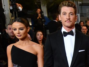 Miles Teller and his wife Keleigh Sperry arrive for the screening of the film "Too Old To Die Young - North of Hollywood, West of Hell" at the 72nd edition of the Cannes Film Festival in Cannes, southern France, on May 17, 2019.