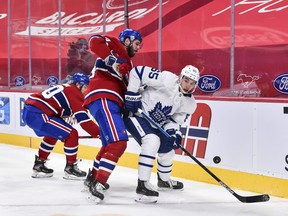 Joel Edmundson  of the Montreal Canadiens and Ilya Mikheyev of the Toronto Maple Leafs, jostling for the puck during an earlier , could be unlikely heroes for their respective teams.