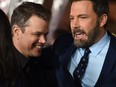 Actors Matt Damon, left, and Ben Affleck arrive for the world premiere of Warner Bros. "Live By Night," Jan. 9, 2017 at the TCL Chinese Theater in Hollywood, Calif.