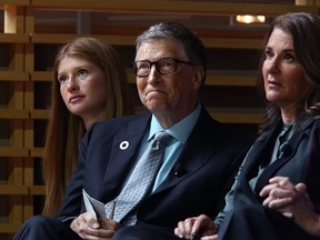 Jennifer Gates, left, and her parents, Bill and Melinda Gates, listen to former U.S. President Barack Obama speak at the Gates Foundation Inaugural Goalkeepers event on Sept. 20, 2017 in New York City.