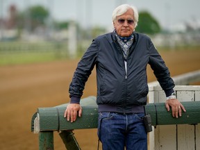 Bob Baffert, trainer of Kentucky Derby winner Medina Spirit, stands near the track at Churchill Downs in Louisville, Kentucky, U.S. April 28, 2021.