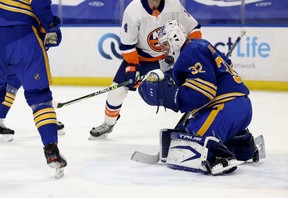 Cast-off Michael Houser has earned two wins tending goal for the Buffalo Sabres, another wonderful story that has been obscured by the ugliness of the Tom Wilson incident. USA TODAY SPORTS