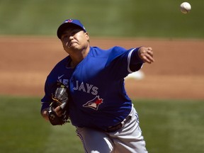 Blue Jays starter Hyun Jin Ryu delivers a pitch against the Athletics during the second inning at RingCentral Coliseum in Oakland, Thursday, May 6, 2021.