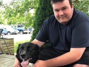 Owen Brandies is pictured with his family dog, Ronni.