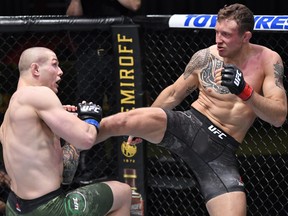 In this handout image from the UFC, Jack Hermansson, right, of Sweden kicks Marvin Vettori of Italy in a middleweight bout during the UFC Fight Night event at UFC APEX on Dec. 5, 2020 in Las Vegas, Nevada.