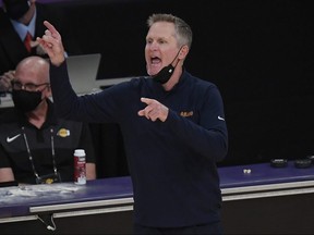 Head coach Steve Kerr of the Warriors directs his team during the first half of an NBA Tournament Play-In game against the Lakers at Staples Center in Los Angeles, May 19, 2021.