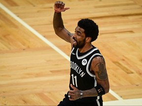 Kyrie Irving of the Brooklyn Nets reacts during Game 4 of the Eastern Conference first round series against the Boston Celtics at TD Garden on May 30, 2021 in Boston, Mass.