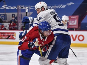 Eric Staal of the Montreal Canadiens skates into Joe Thornton of the Toronto Maple Leafs at the Bell Centre on May 25, 2021 in Montreal.