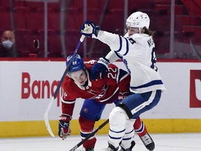 Leafs forward William Nylander checks Montreal Canadiens forward Cole Caufield during the second period in Game 6 at the Bell Centre last night. USA TODAY Sports