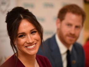 Britain's Meghan, the Duchess of Sussex, and Prince Harry, Duke of Sussex, attend a roundtable discussion on gender equality at Windsor Castle in Windsor, England, Oct. 25, 2019.