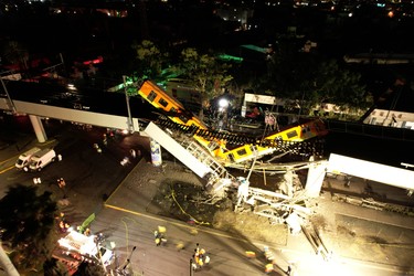 A general view of damage caused after a railway overpass and train collapsed onto a busy road in this drone picture obtained from social media Mexico City, Mexico May 4, 2021. Picture taken with a drone. INSTAGRAM @CSDRONES/via REUTERS