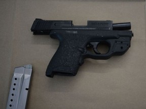 A  Smith & Wesson 9 mm semi-auto handgun with an 8 round magazine seized on May 20, 2021.