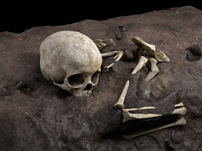 The remains of a child roughly age 3 who lived about 78,000 years ago and was found in a burial pit at a cave site in Kenya called Panga ya Saidi, the oldest-known human burial in Africa, are seen in an undated virtual reconstruction.