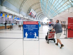 A man at Pearson Airport in Toronto. A report revealed some shocking new information that confirms concerns about our current border measures and quarantine system being leaky, writes Brian Lilley.