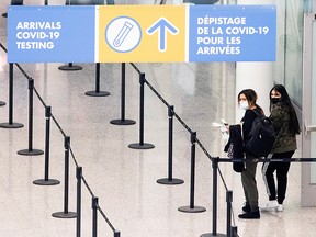 Passengers arrive at Toronto's Pearson airport after mandatory coronavirus disease (COVID-19) testing took effect for international arrivals February 1, 2021.
