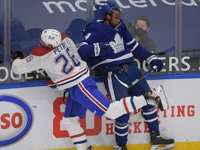 Montreal Canadiens defenceman Jeff Petry (left) collides with Toronto Maple Leafs forward Wayne Simmonds during the regular season. The Leafs and Canadiens are meeting in the opening round of the NHL playoffs.