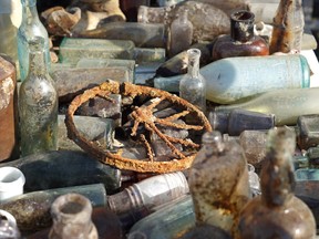 A rusty wheel, assorted glass bottles and containers are among the items being dug up as waterfront Toronto redevelops the city's Port Lands.