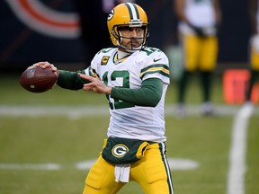 Aaron Rodgers of the Green Bay Packers warms up prior to the game against the Chicago Bears at Soldier Field on January 3, 2021 in Chicago.
