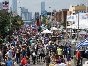 Crowds take in Taste of the Danforth on Danforth Ave. in Toronto on August 12, 2017.