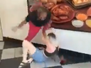 In a viral video, two women brawl inside a Little Caesars pizzeria in Georgia. 