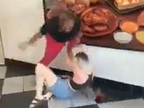 In a viral video, two women brawl inside a Little Caesars pizzeria in Georgia.