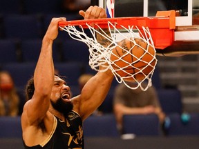 Khem Birch of the Toronto Raptors  dunks during a game against the Brooklyn Nets on April 27, 2021.