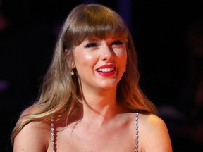In a handout picture released by the Brit Awards, U.S. singer-songwriter Taylor Swift attends the Brit Awards 2021 in London on May 11, 2021.